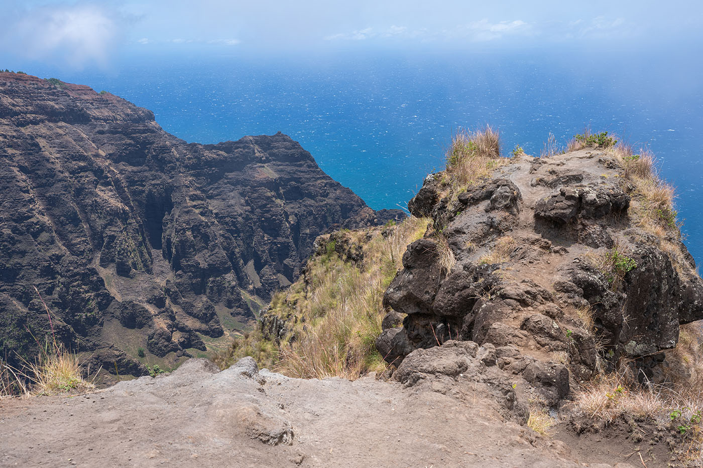 awaawapuhi-trail-overlook.jpg Narrow rocky Awaawapuhi overlook above the Na Pali Coast and Pacific Ocean