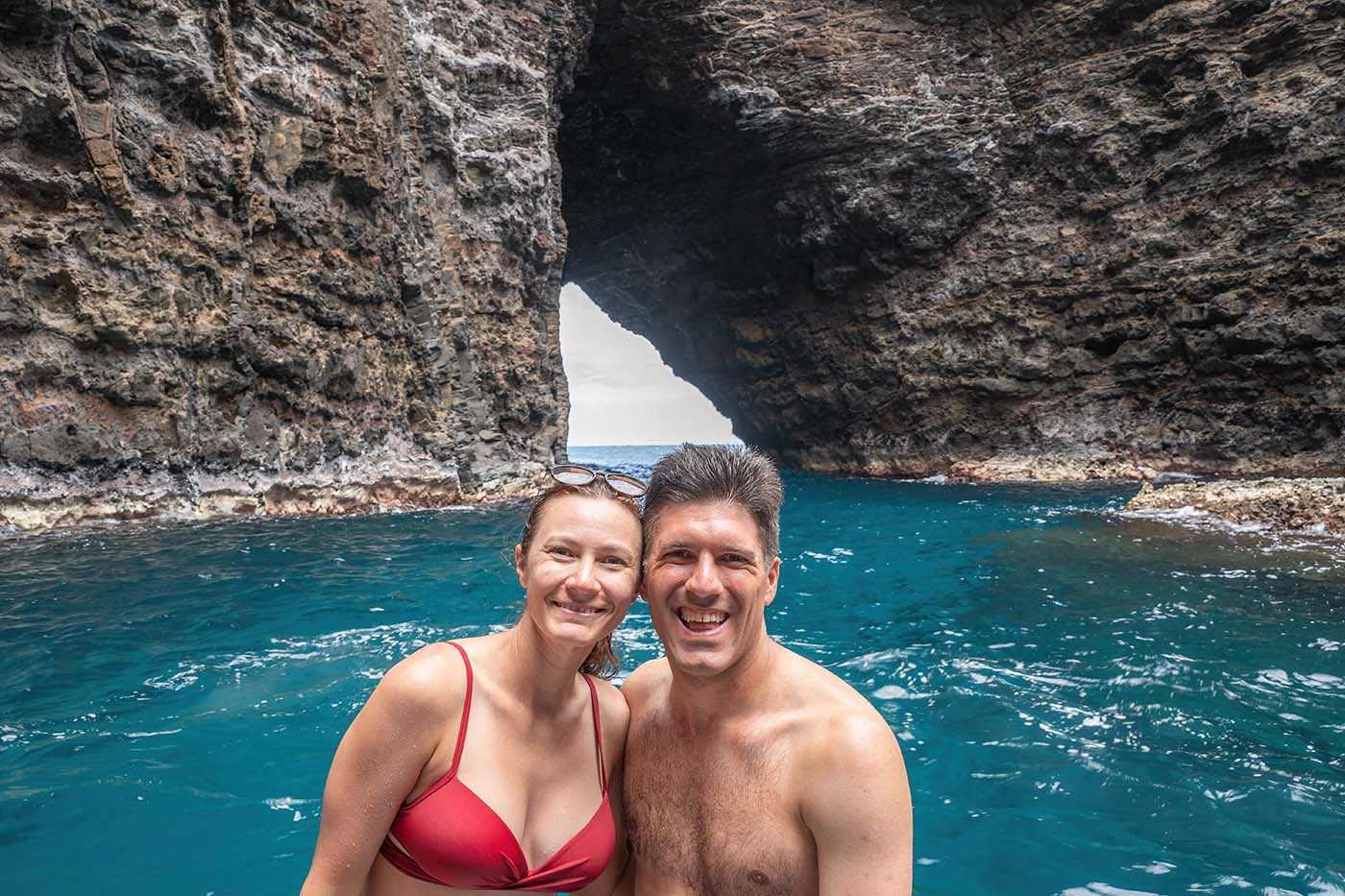 no-ceiling-sea-cave.jpg Couple posing in the open-roof sea cave along the Na Pali Coast