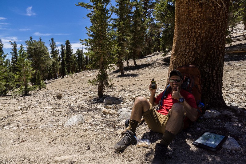 Backpacker celebrating a family message received on his InReach