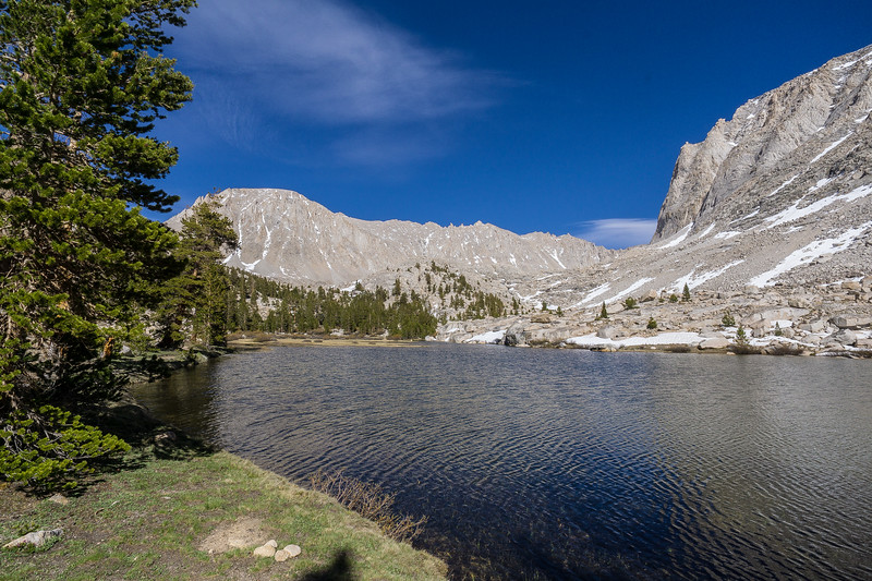 Mountain lake below the granite peaks near the Pacific Crest Trail