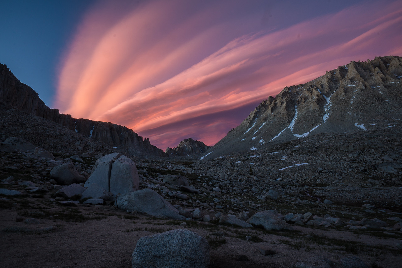 Pink sunset clouds over the rocky Mount Whitney basin at Guitar Lake