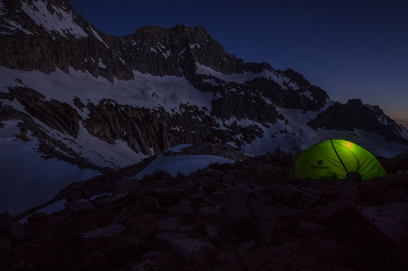 Illuminated green tent at the high Kaweah Gap campsite after dark