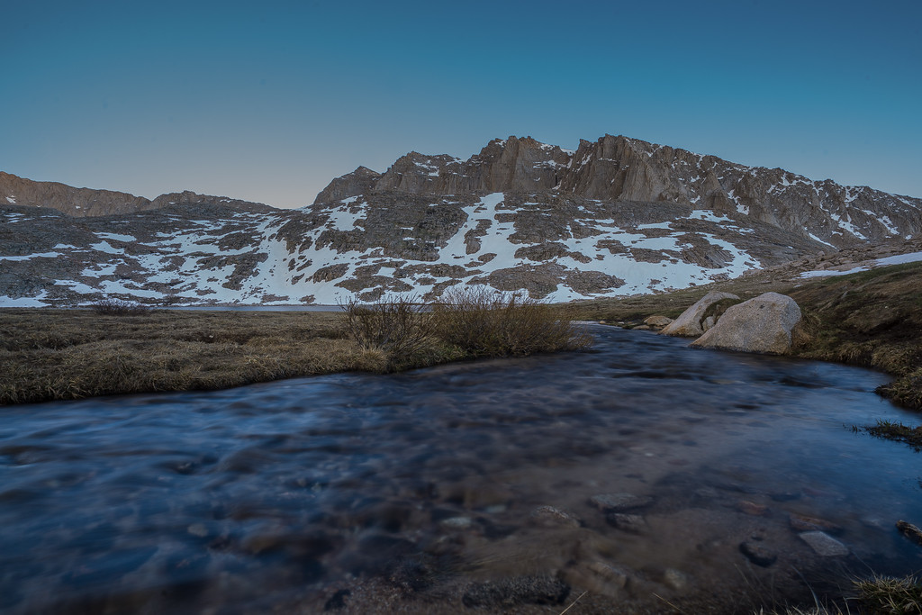 Stream flowing from Guitar Lake at dusk below Mount Whitney