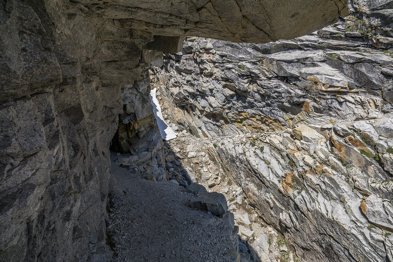Rock tunnel blasted into the cliff above Hamilton Lake