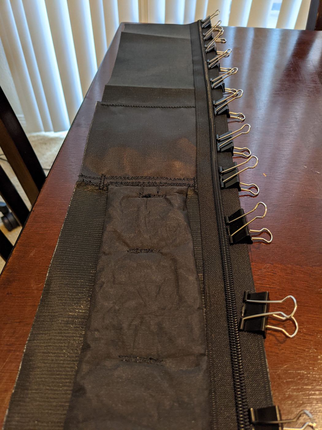 myog-zipper.jpg Back-panel zipper clipped in place along the black Dyneema fabric