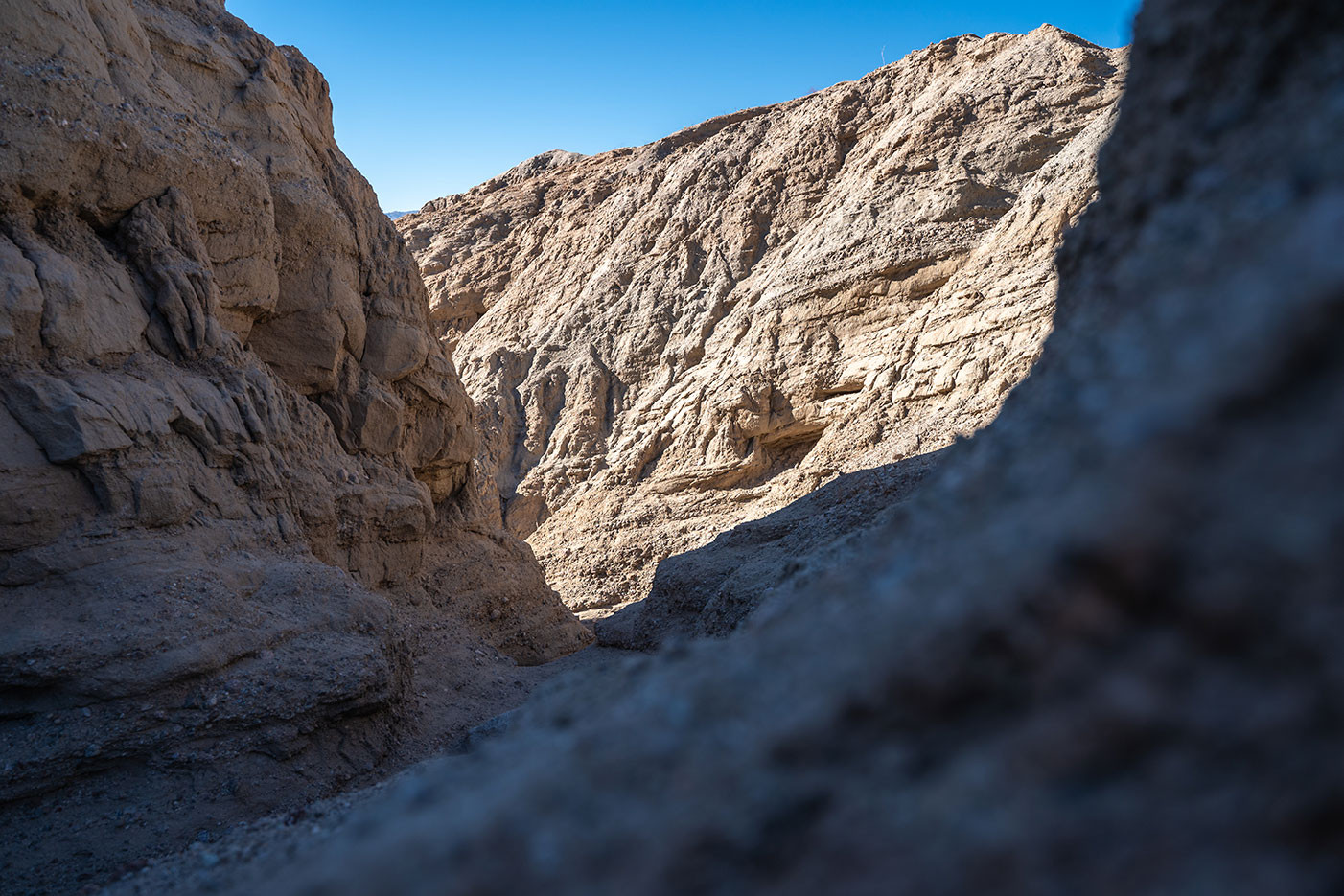 anza-borrego-slot-canyon-view.jpg Sunlight and shadow across the winding walls near the start of The Slot