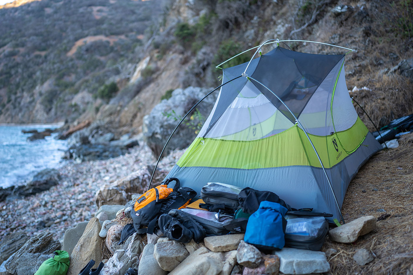 italian-gardens-4-catalina-island-tent.jpg Tent and paddling gear set above the rocky shoreline at Italian Gardens 4
