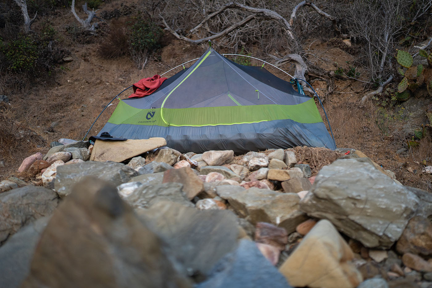 italian-gardens-4-rocks.jpg Tent sheltered behind a low rock wall at Italian Gardens 4