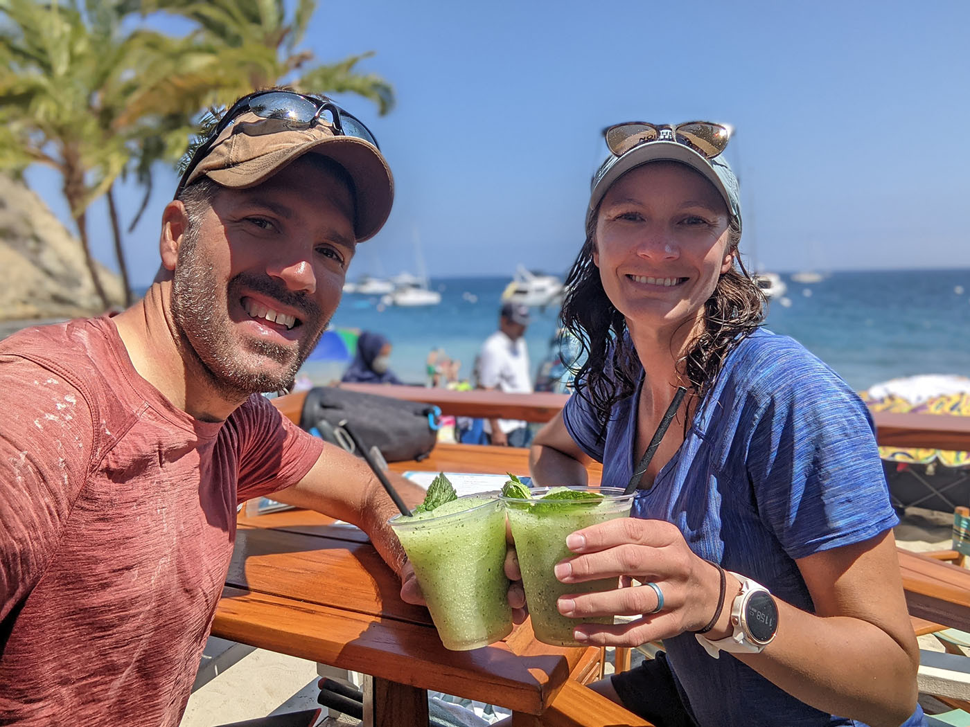 descanso-beach-mojito.jpg Two kayakers toast green mojitos after returning to Descanso Beach