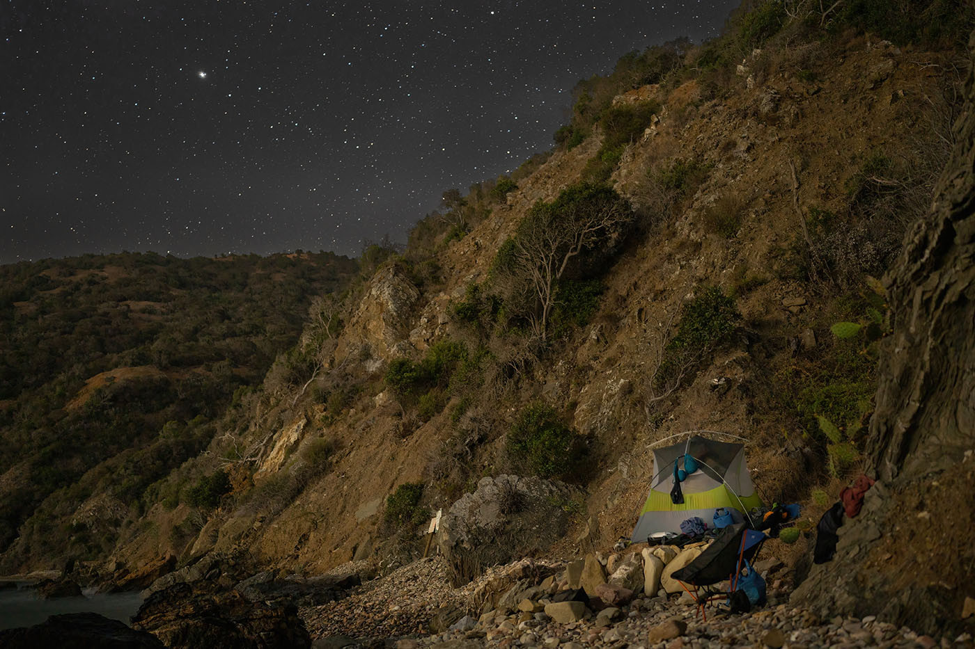 catalina-island-astrophotography.jpg Star-filled night sky above the tent and rocky Italian Gardens campsite